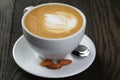 Cup of fresh cappuccino with latte art Royalty Free Stock Photo