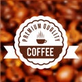Cup of fresh hot coffee with scent Vector label on the blur cof