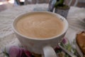 Cup of fresh hot tasty capuccino Royalty Free Stock Photo