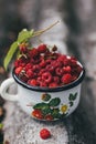 Cup of fresh raspberries. Concept for healthy nutrition. Rustic background. Close up. Royalty Free Stock Photo