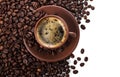 Cup of freshly brewed coffee on pile of coffee beans isolated on white Royalty Free Stock Photo