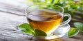 Cup of freshly brewed Tea on a rustic wooden table