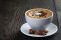 Cup of freshly made cappuccino with latte art Royalty Free Stock Photo