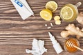 Cup of ginger tea, honey, lemon, pills, thermometer Royalty Free Stock Photo