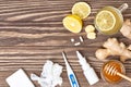 Cup of ginger tea, honey, lemon, pills, thermometer Royalty Free Stock Photo