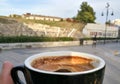 Greek coffee with the first ancient theater of Larissa