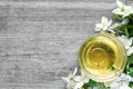 Cup of green tea with jasmine over rustic wooden background Royalty Free Stock Photo