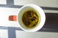 A cup of green tea in natural lightining