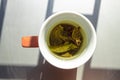 A cup of green tea in natural lightining