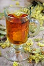 Cup of herbal tea and honey. medicinal herbs. close-up. remedy for flu and cold Royalty Free Stock Photo