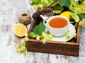 Cup of herbal tea with linden flowers Royalty Free Stock Photo