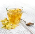 Cup of herbal tea with linden flowers Royalty Free Stock Photo