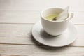 Cup of herbal tea on table Royalty Free Stock Photo