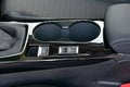 Cup holder between the front seats in the car Royalty Free Stock Photo