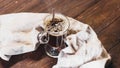 A cup of hot black coffee on a brown wooden table Royalty Free Stock Photo