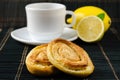 Cup of hot black tea, lemon, homemade cookies Royalty Free Stock Photo