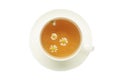 Cup of hot chamomile tea isolated on white background Royalty Free Stock Photo