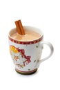 Cup of hot chocolate with cinnamon stick on white Royalty Free Stock Photo