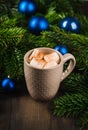 Cup of hot chocolate with marshmallow on the wooden table. Christmas decorations. Selective focus. Shallow depth of field Royalty Free Stock Photo