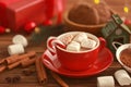 Cup of hot cocoa drink with marshmallows on table Royalty Free Stock Photo