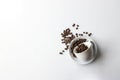 Cup of Hot Coffee and beans on White Background