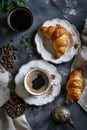 Cup Hot coffee Cappuccino and croissant on a dark old wooden background in morning light. Breakfast concept Royalty Free Stock Photo