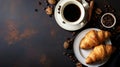 Cup Hot coffee Cappuccino and croissant on a dark old wooden background in morning light. Breakfast concept Royalty Free Stock Photo