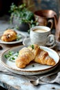 Cup Hot coffee Cappuccino and croissant on a dark old wooden background in morning light. Breakfast concept Royalty Free Stock Photo