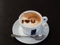 Cup of hot coffee cappuccino, latte decorated with heart art I love you message Royalty Free Stock Photo