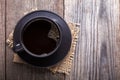 Cup of hot espresso among on wooden vintage table, coffee on the Royalty Free Stock Photo