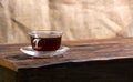 A cup of hot herbal tea and cookies on the old wooden background Royalty Free Stock Photo