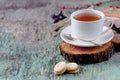 A cup of hot herbal tea and cookies on the old wooden background. Cup of tea herbal tea hot drink Baking Cookies Vintage texture b Royalty Free Stock Photo