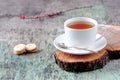 A cup of hot herbal tea and cookies on the old wooden background. Cup of tea herbal tea hot drink Baking Cookies Vintage texture b Royalty Free Stock Photo