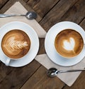 Cup of hot latte art coffee Royalty Free Stock Photo