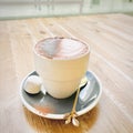 A cup of hot mocha in a white cup with a marshmallow. Royalty Free Stock Photo