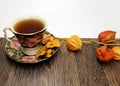 A Cup of hot tea with dried fruits on a table Royalty Free Stock Photo