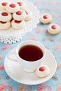 Cup of hot tea and homemade almond cookies