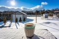 A cup of hot tea on the snowy garden terrace at winter Royalty Free Stock Photo