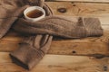 Cup of hot tea on wooden table. Cold autumn or winter days