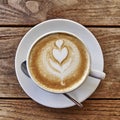 Cup of hotlatte art coffee closeup Royalty Free Stock Photo