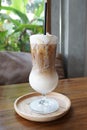 Cup of ice coffee latte on wooden table Royalty Free Stock Photo