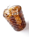 Cup of iced cola on white with clipping path