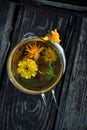 Marigold with Calendula flowers and mint