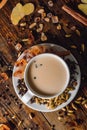 Cup of Infusion with Milk and Spices Royalty Free Stock Photo