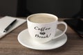 Cup with inscription Coffee Break on wooden table in office Royalty Free Stock Photo