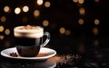 cup of latte coffee with cinnamon, star anise and whipped cream on a plate, blurred sparkling dark and orange background Royalty Free Stock Photo