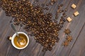 Cup with leftover coffee. Coffee grains, star anise and pieces of brown sugar Royalty Free Stock Photo