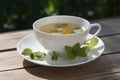Cup of Lemon Balm leaf tea. Generative AI Royalty Free Stock Photo