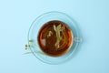 Cup linden tea on blue background, top view Royalty Free Stock Photo
