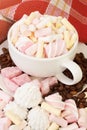 Cup of marshmallows sweet with coffee beens